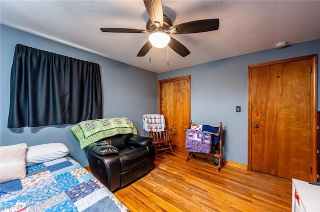 225 Circle Dr, White Oak, PA 15131 - bedroom featuring light wood-type flooring, baseboards, and ceiling fan
