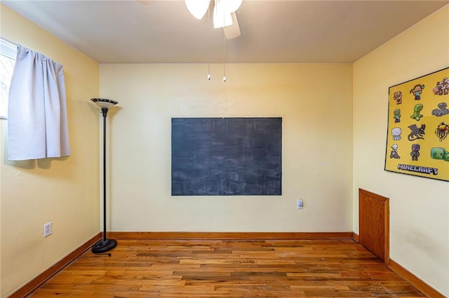 225 Circle Dr, White Oak, PA 15131 - empty room with baseboards, a ceiling fan, and wood finished floors
