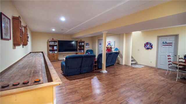living room with stairway, wood finished floors, and recessed lighting