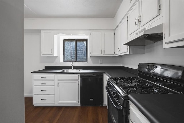 kitchen with dark countertops, black appliances, under cabinet range hood, dark wood finished floors, and a sink
