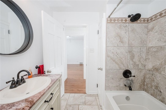 full bath with vanity and bathtub / shower combination