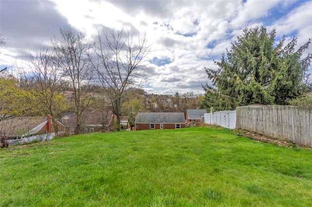 view of yard featuring fence