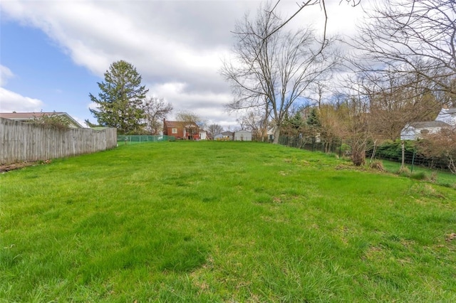 view of yard featuring fence