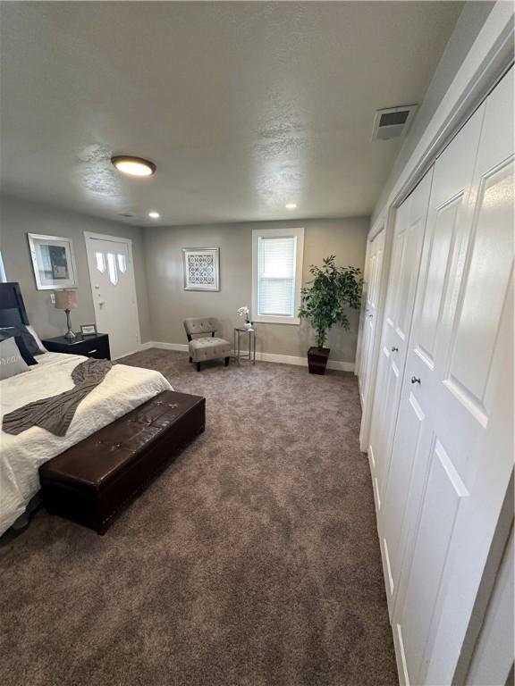 535 Grant Ave, Heidelberg, PA 15106 - carpeted bedroom featuring visible vents, baseboards, and multiple windows