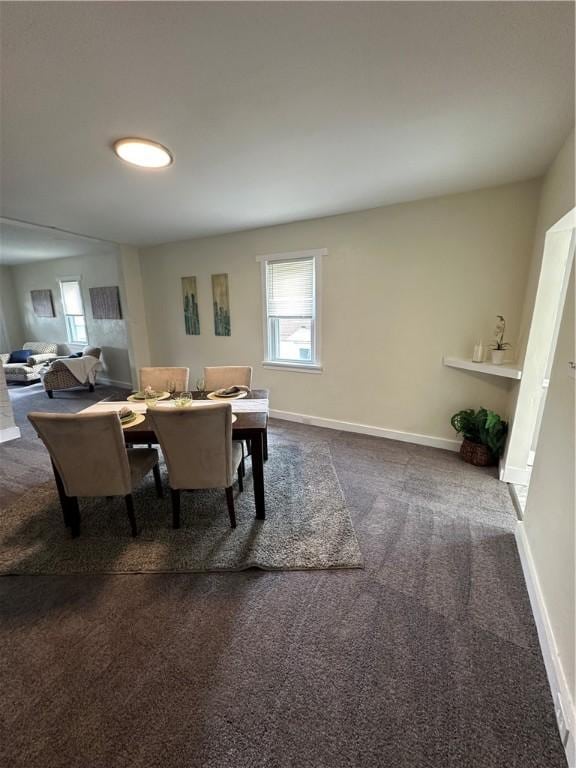 535 Grant Ave, Heidelberg, PA 15106 - dining room with baseboards and dark colored carpet