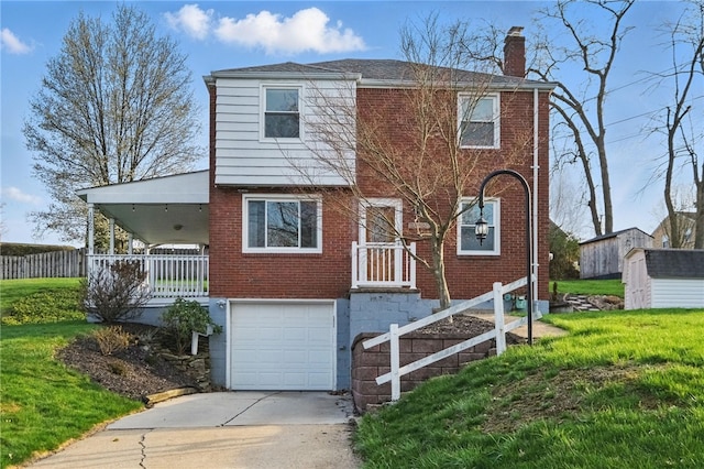 view of front of home featuring a front yard, an attached garage, a chimney, concrete driveway, and brick siding