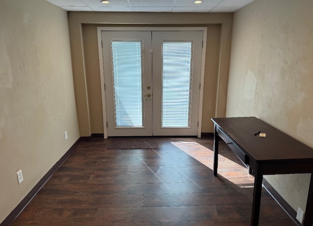 21 Garden Ter, Churchill Boro, PA 15221 - doorway with french doors, a drop ceiling, dark wood-type flooring, baseboards, and a textured wall