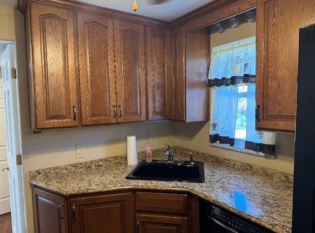21 Garden Ter, Churchill Boro, PA 15221 - kitchen with a sink, dishwasher, and light stone countertops
