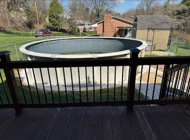 21 Garden Ter, Churchill Boro, PA 15221 - view of pool featuring a lawn, a residential view, and a deck