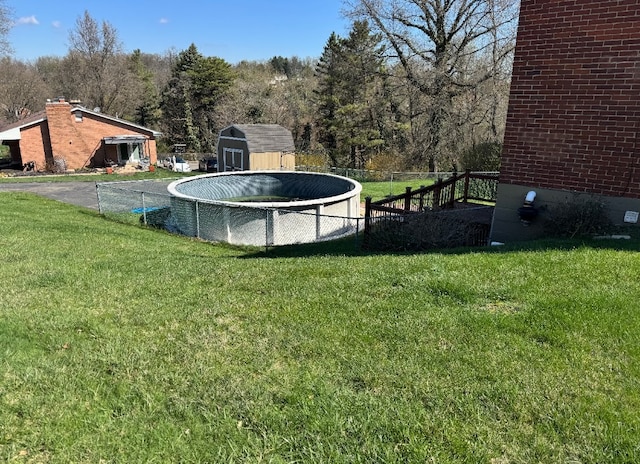 21 Garden Ter, Churchill Boro, PA 15221 - view of yard with a storage unit and an outbuilding