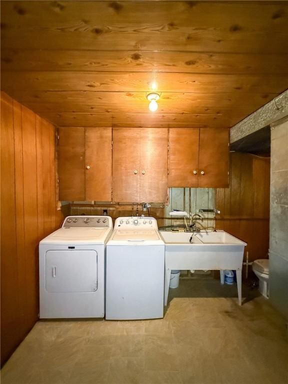 210 Locust St, Rural Valley Boro, PA 16249 - clothes washing area with a sink, laundry area, wood ceiling, wooden walls, and washing machine and dryer