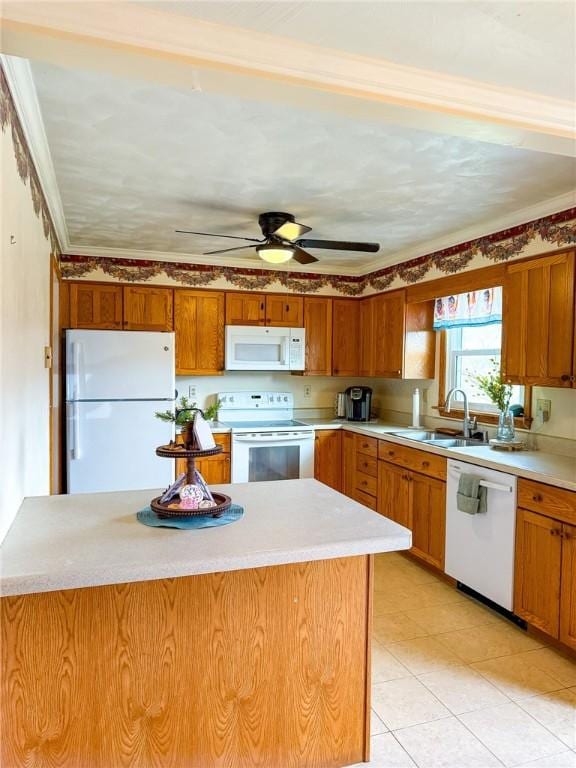 210 Locust St, Rural Valley Boro, PA 16249 - kitchen with light countertops, a sink, white appliances, and brown cabinetry