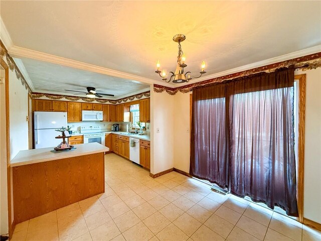 210 Locust St, Rural Valley Boro, PA 16249 - kitchen with a sink, light countertops, white appliances, a peninsula, and brown cabinetry