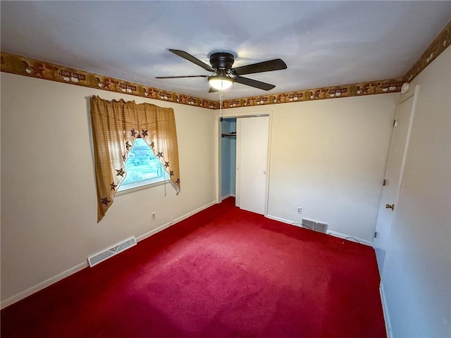 210 Locust St, Rural Valley Boro, PA 16249 - spare room with dark carpet, visible vents, ceiling fan, and baseboards