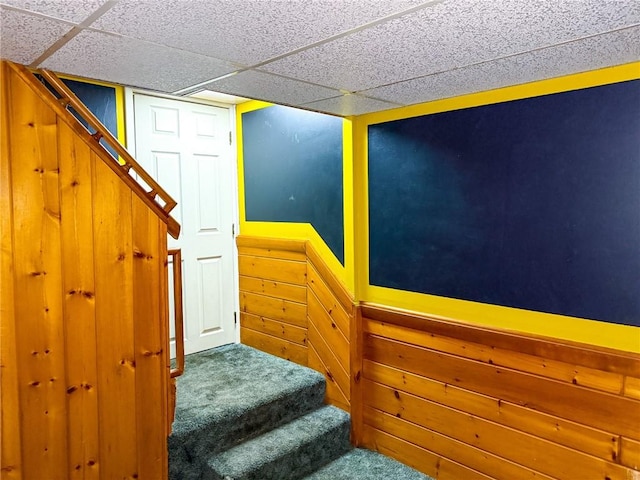210 Locust St, Rural Valley Boro, PA 16249 - stairs with carpet, a drop ceiling, and wooden walls