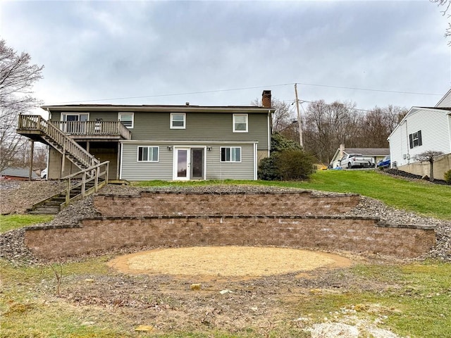 210 Locust St, Rural Valley Boro, PA 16249 - view of front of property featuring stairs, a deck, a chimney, and a front lawn