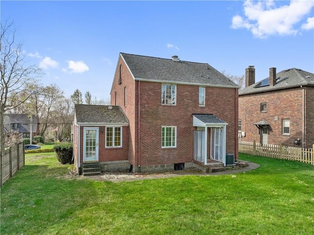 210 Morewood Rd, Shaler, PA 15116 - rear view of house featuring brick siding, a lawn, and fence
