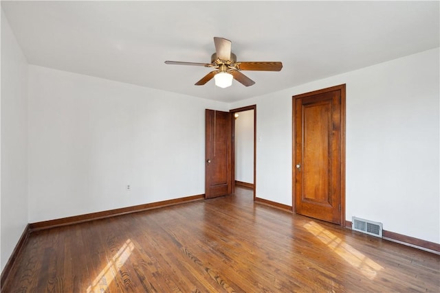 210 Morewood Rd, Shaler, PA 15116 - unfurnished room featuring wood finished floors, visible vents, a ceiling fan, and baseboards