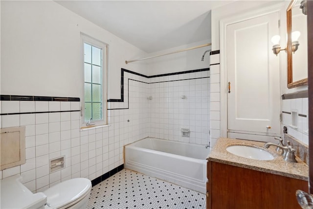 210 Morewood Rd, Shaler, PA 15116 - bathroom with shower / tub combination, vanity, toilet, and tile walls