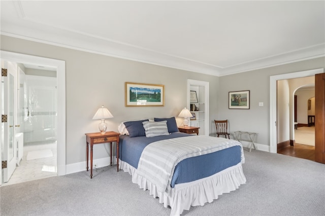 918 W Waldheim Rd, Fox Chapel, PA 15215 - bedroom with carpet flooring, arched walkways, crown molding, baseboards, and connected bathroom