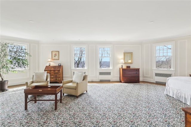 918 W Waldheim Rd, Fox Chapel, PA 15215 - bedroom featuring radiator, a decorative wall, and ornamental molding