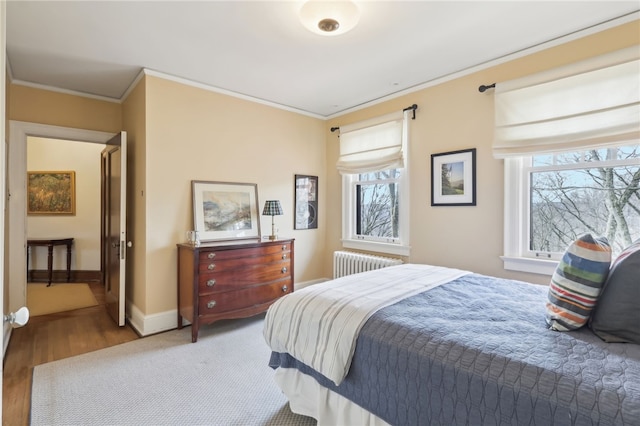 918 W Waldheim Rd, Fox Chapel, PA 15215 - bedroom with radiator, ornamental molding, baseboards, and wood finished floors