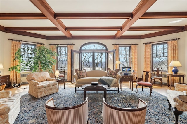 918 W Waldheim Rd, Fox Chapel, PA 15215 - living area featuring coffered ceiling, plenty of natural light, beamed ceiling, wood finished floors, and radiator