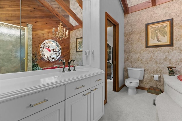 bathroom featuring wood walls, toilet, a chandelier, and vanity