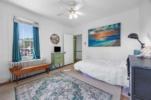 1556 W Ingomar Rd, Franklin Park, PA 15237 - bedroom featuring radiator heating unit, baseboards, ceiling fan, and carpet