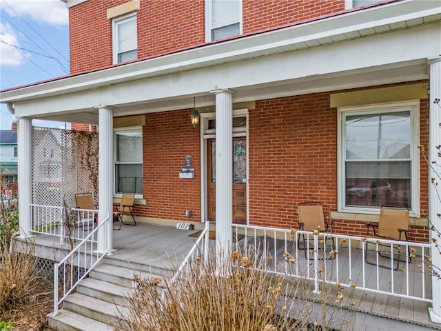 101 Cherry Ave, Houston, PA 15342 - doorway to property featuring brick siding and covered porch