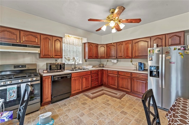 101 Cherry Ave, Houston, PA 15342 - kitchen with under cabinet range hood, light countertops, a sink, and appliances with stainless steel finishes