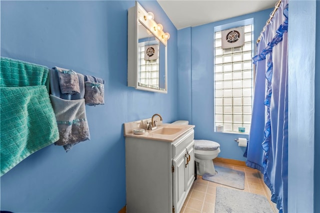101 Cherry Ave, Houston, PA 15342 - bathroom with vanity, a shower with curtain, toilet, tile patterned floors, and baseboards