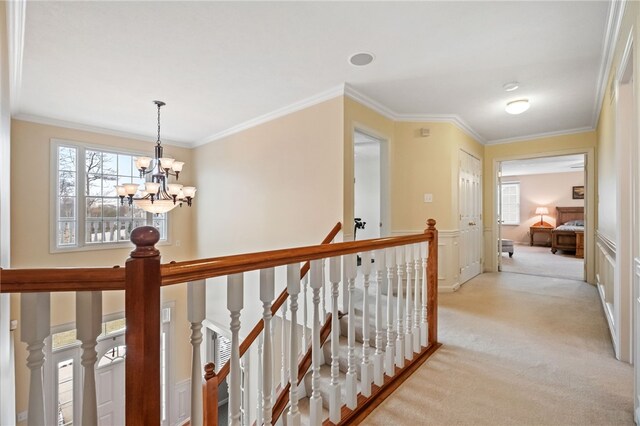 107 Stafford Ct, Ohio Twp, PA 15237 - corridor with an upstairs landing, a notable chandelier, light colored carpet, and ornamental molding