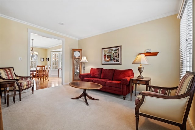 107 Stafford Ct, Ohio Twp, PA 15237 - living room with crown molding, an inviting chandelier, baseboards, and carpet floors