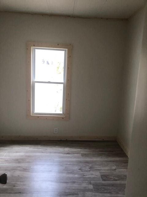 23 Gilmore Ln, Sandy Lake Twp, PA 16153 - empty room with wood finished floors