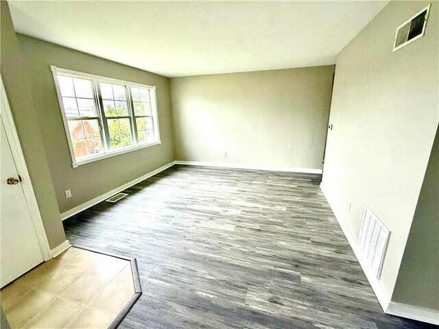 1347 Coronado, Port Vue, PA 15133 - spare room featuring wood finished floors and baseboards