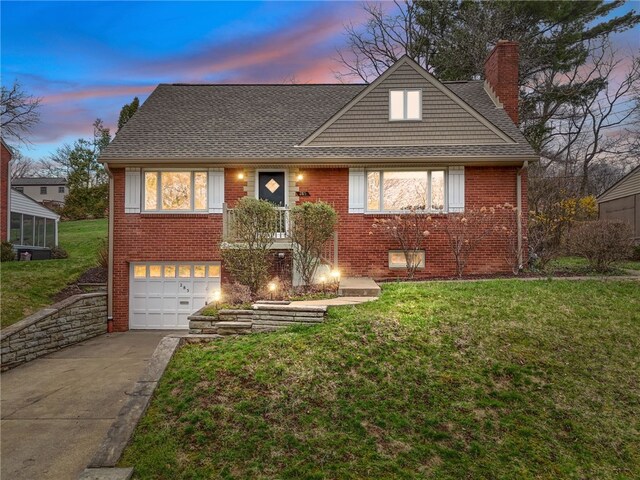 285 Park Entrance Dr, Mt Lebanon, PA 15228 - view of front of home with an attached garage, a lawn, driveway, and a chimney