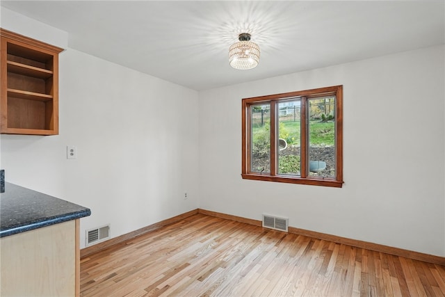 285 Park Entrance Dr, Mt Lebanon, PA 15228 - unfurnished dining area with light wood finished floors, baseboards, and visible vents