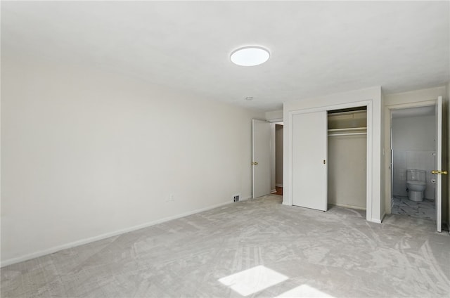 285 Park Entrance Dr, Mt Lebanon, PA 15228 - unfurnished bedroom with a closet, baseboards, connected bathroom, and light colored carpet