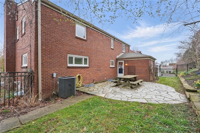 285 Park Entrance Dr, Mt Lebanon, PA 15228 - rear view of house featuring central AC unit, a patio area, a chimney, fence, and brick siding