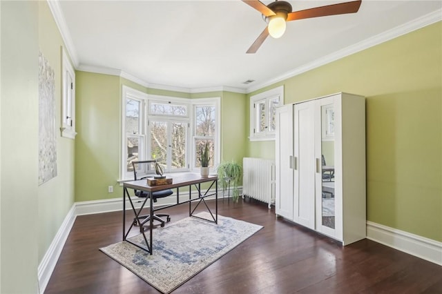 office area with radiator heating unit, baseboards, crown molding, and wood finished floors