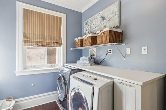 laundry area with separate washer and dryer, baseboards, ornamental molding, laundry area, and wood finished floors
