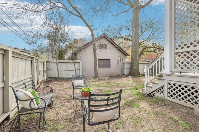 view of yard featuring a fenced backyard