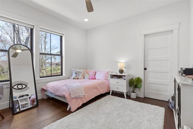 bedroom featuring ceiling fan, dark wood-style floors, and recessed lighting