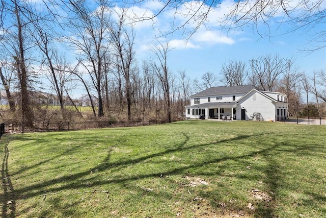 view of yard with fence