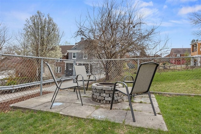 view of patio / terrace featuring an outdoor fire pit and fence