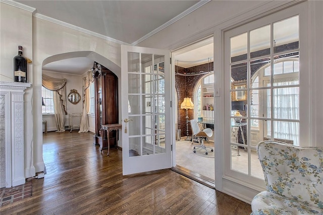 552 N Maple Ave, City Of Greensburg, PA 15601 - entryway featuring arched walkways, dark wood-style flooring, and ornamental molding