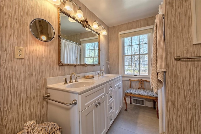 552 N Maple Ave, City Of Greensburg, PA 15601 - bathroom featuring double vanity, a sink, tile patterned flooring, and visible vents