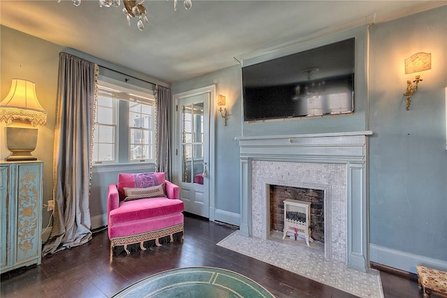 552 N Maple Ave, City Of Greensburg, PA 15601 - sitting room featuring a fireplace, wood-type flooring, and baseboards