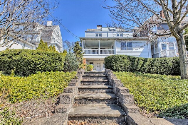 552 N Maple Ave, City Of Greensburg, PA 15601 - rear view of property with a chimney, stairway, and a balcony